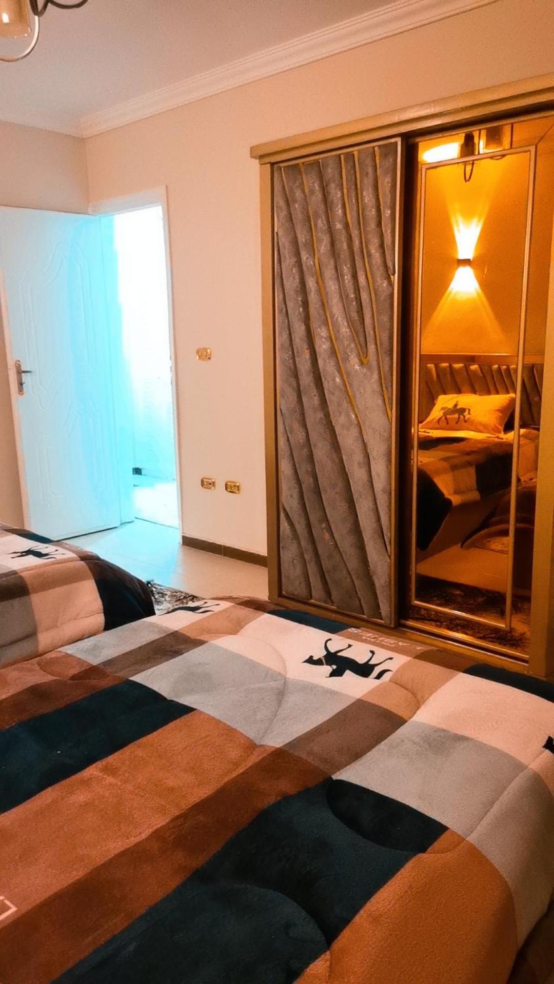 ١٠ب شارع حافظ رمضان مكرم عبيد أمام سيتي سنتر مكرم عبيد Apartment *